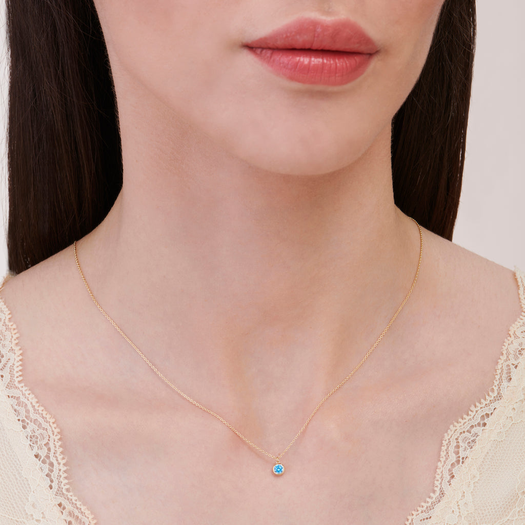 Gold Necklace with Blue Stone